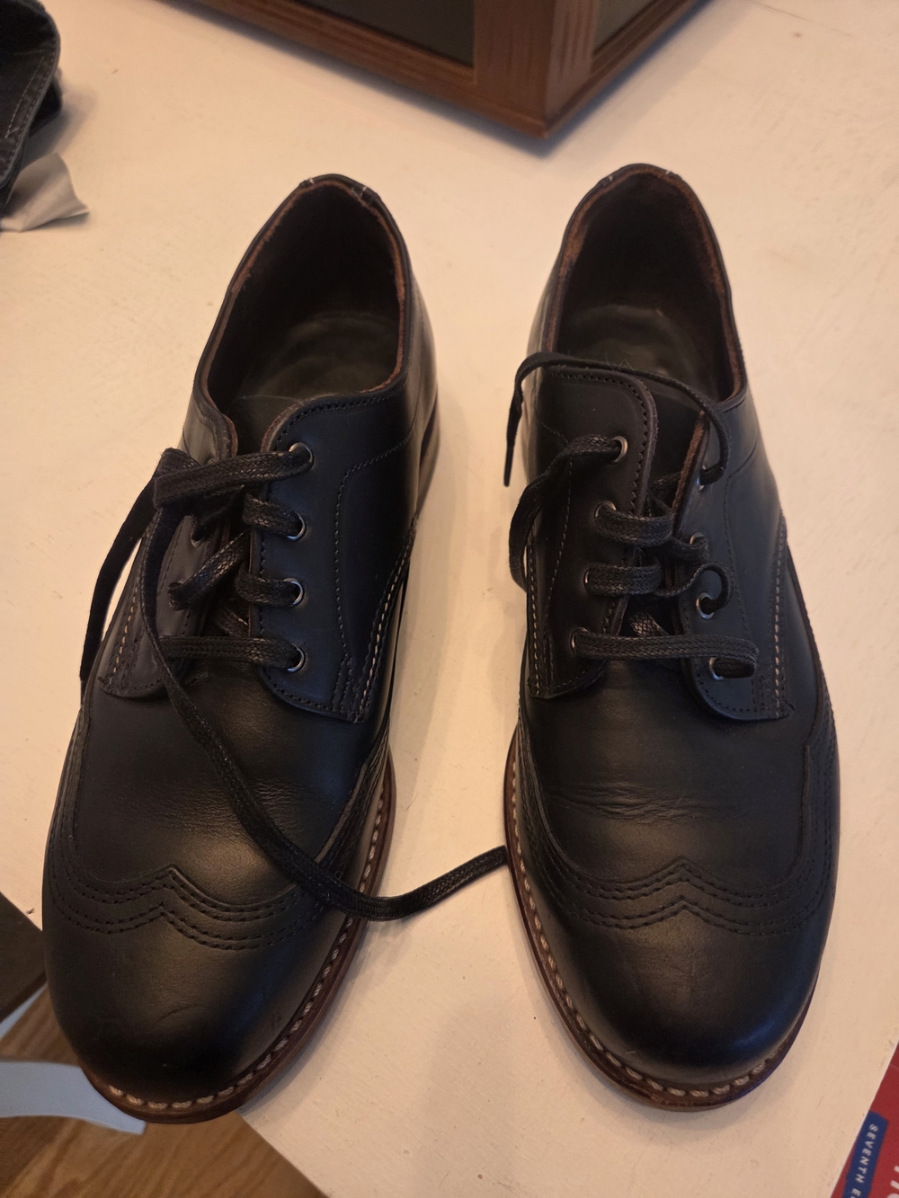 Wolverine Black Leather Wingtip Derby Shoes with Brown Welt